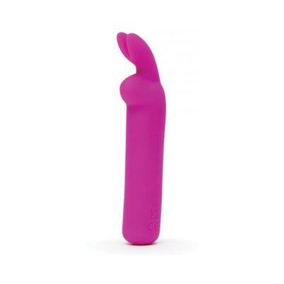 Compact purple silicone bullet vibrator with flexible bunny ears for targeted clitoral stimulation.