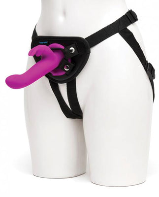 Purple Happy Rabbit vibrating strap-on with adjustable black harness displayed on mannequin.
