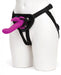 Purple Happy Rabbit vibrating strap-on with adjustable black harness displayed on mannequin.