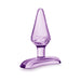 Purple tapered beginner-friendly anal plug with a flat base and decorative swirl detail by Blush Play With Me Hard Candy.