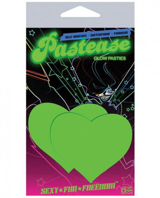 Packaging of Pastease brand glow-in-the-dark heart-shaped pasties with neon green design on black background.