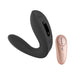 Black C-shape vibrating plug with remote control in rose gold, featuring touch buttons and ergonomic design.