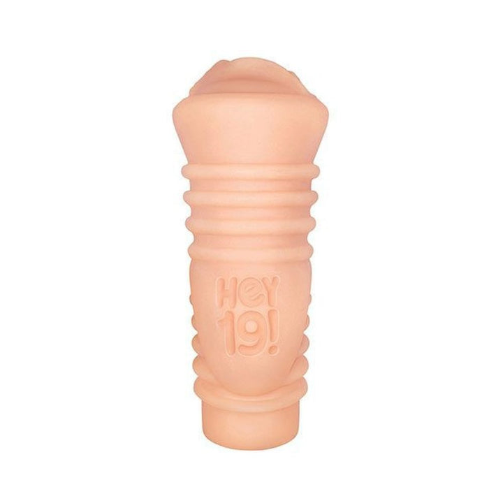 Compact flesh-toned stroker with textured grip and embossed Hey 19! logo on a white background.