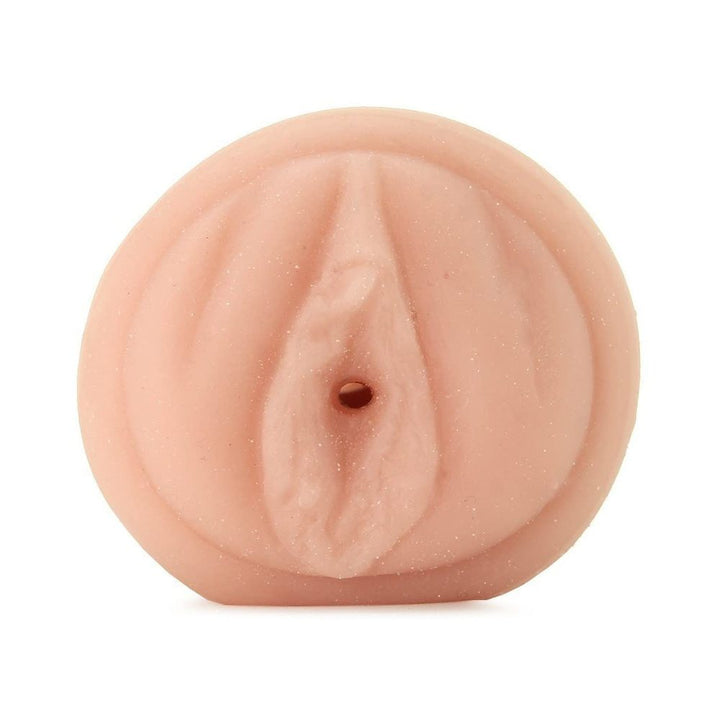 Realistic flesh-toned male stroker toy designed with detailed feminine anatomy features.