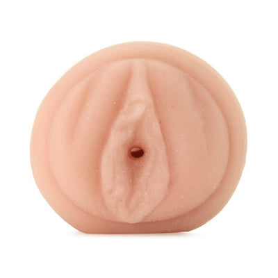 Realistic flesh-toned male stroker toy designed with detailed feminine anatomy features.