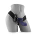 Mannequin wearing a purple hollow strap-on with adjustable black straps and attached remote control.