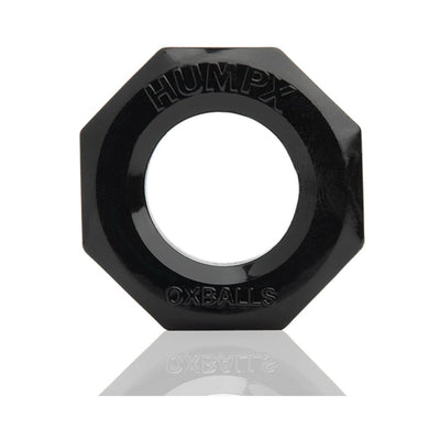 Black octagonal Humpx cockring made from flexible material with embossed branding on a reflective surface.