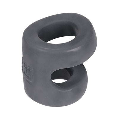 Stone gray dual-ring cock and ball tugger made of stretchy, smooth silicone blend material.