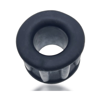 Black soft silicone and TPR ballstretcher with eight ribbed stretch sections and a smooth rounded edge design.
