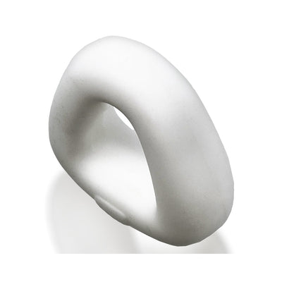 White trapezoid-shaped flexible cockring with smooth matte finish on a white background.