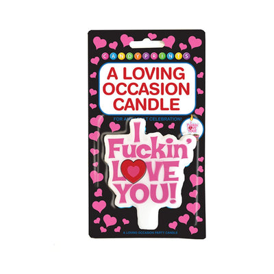 A novelty party candle with bold pink text and a red heart, reading "I Love You," on black packaging with pink hearts.