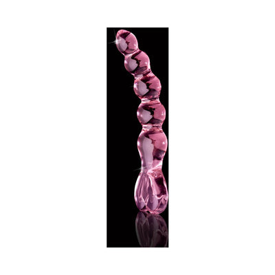 Pink glass beaded massager with a curved, textured shaft and heart-shaped handle on a black background.