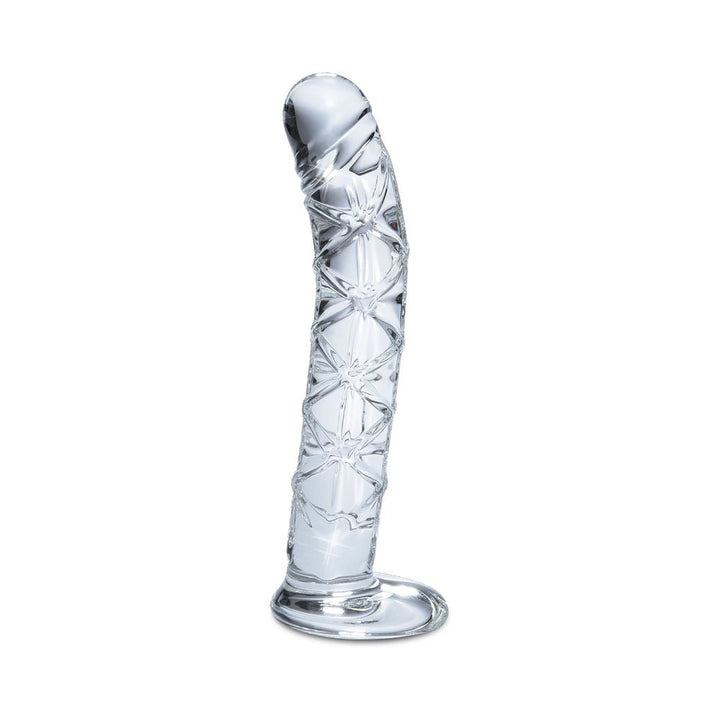 Clear hand-blown glass G-spot massager with textured shaft and curved tip, standing upright on a flat base.