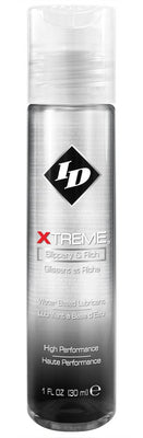 Clear 1 fl oz bottle of ID Xtreme water-based personal lubricant with black and red branding.
