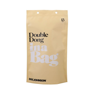Beige resealable pouch packaging for Doc Johnson In A Bag Double Dong 13-inch clear adult toy.
