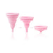 Pink Intimina Lily Cup Compact menstrual cup shown in three stages of collapsing for easy storage.