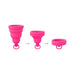 Pink Intimina Lily Cup One menstrual cup shown in three stages of folding for compact storage and portability.