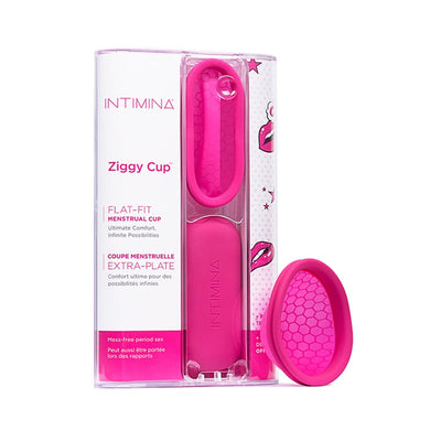 Pink Intimina Ziggy Cup flat-fit menstrual cup with honeycomb texture and matching silicone storage case in clear packaging.