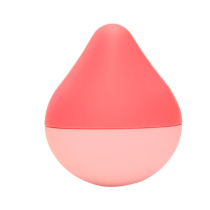 Compact pink and coral teardrop-shaped palm-sized massager with smooth matte finish.