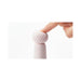 Soft pink Iroha Rin Akane Massager with flexible rounded tip being gently pressed by a finger.