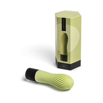 Iroha Zen mini vibrator in green tea color with textured silicone surface and matching hexagonal packaging box.