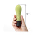 Hand holding a 5-inch green tea colored Iroha Zen mini vibrator with textured silicone surface and black base.