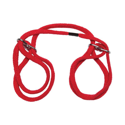 Red Japanese style cotton wrist or ankle cuffs with metal slip rings for adjustable restraint.