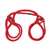 Red Japanese style cotton wrist or ankle cuffs with metal slip rings for adjustable restraint.
