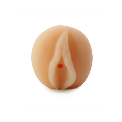 Compact flesh-toned pocket-sized masturbator with a soft, realistic texture and ribbed inner canal.