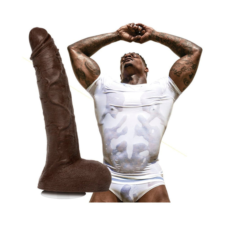 Realistic 10-inch brown dildo with suction base next to a muscular man in a wet white shirt and underwear.