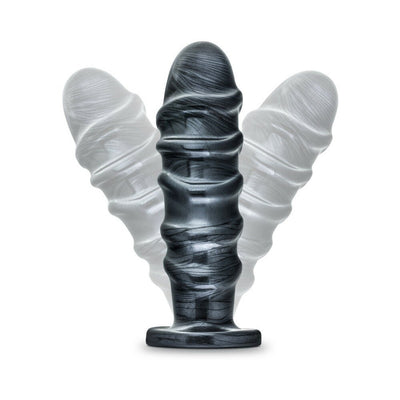 Carbon metallic black tapered butt plug with textured ridges and flared suction cup base shown upright and tilted.