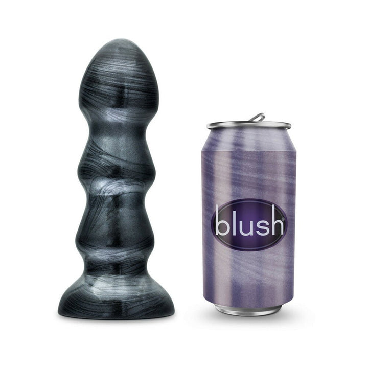 Carbon metallic black flexible PVC bulb with flared suction cup base next to a purple Blush branded can for size comparison.