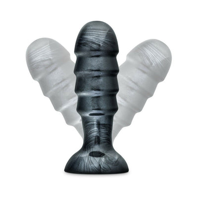 Jet Bruiser Carbon Metallic Black tapered butt plug with ribbed texture and suction cup base shown with motion blur effect.
