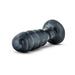 Jet Bruiser Carbon Metallic Black tapered anal plug with ribbed texture and suction cup base on white background.