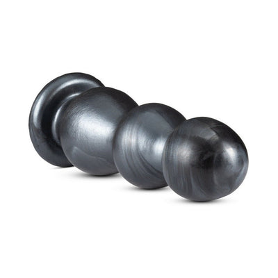 Extra-large metallic black plug with three tapered sections and a flared base for secure, comfortable use.