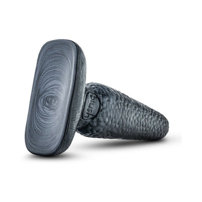 Black textured tapered butt plug with a flat oval base designed for secure placement and comfort.