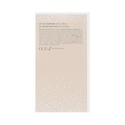 Back view of JO 20th Anniversary Gift Set packaging with product details and usage instructions on a beige background with white confetti design.