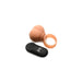 Large vibrating silicone balls with attached ring and black remote control on white background