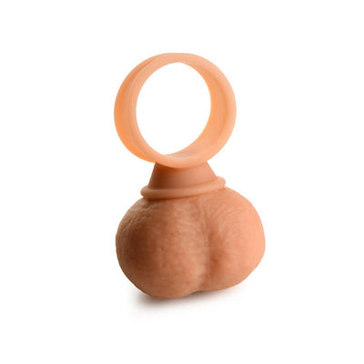 Large vibrating silicone cock ring with textured ball design in a flesh tone, shown on white background.