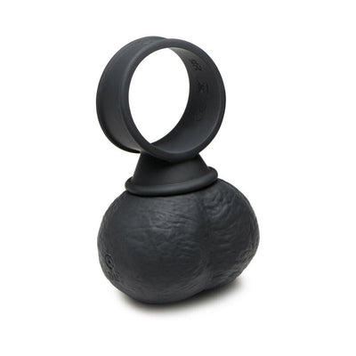 Black silicone vibrating ring with textured ball design and adjustable loop for versatile use.