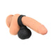 Black silicone vibrating balls worn as a ring on a realistic flesh-toned model for demonstration.