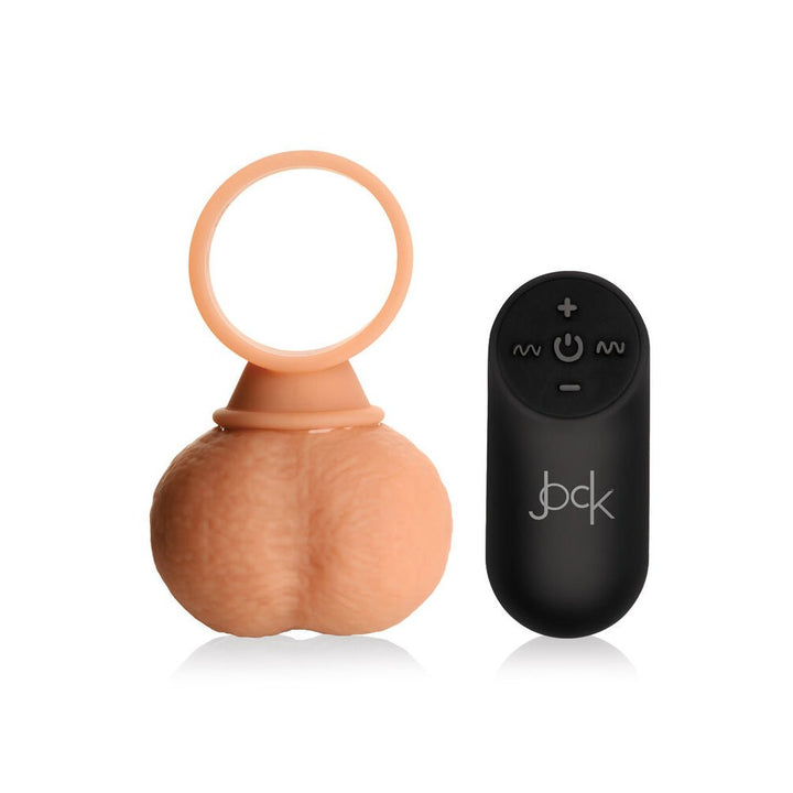 X-large vibrating silicone ball ring with realistic texture and black remote control on white background.