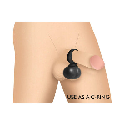 Illustration of black vibrating silicone balls worn as a c-ring on a male figure.
