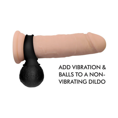 Black vibrating silicone ball attachment shown on a realistic dildo with text about adding vibration and balls to a non-vibrating dildo.