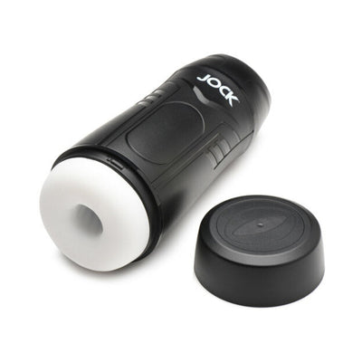 Black and white Jock 9x rechargeable sucking and vibrating male masturbator with removable cap on white background.