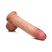 Realistic light-toned dual density silicone dildo with suction base and detailed veining and balls, 10 inches long.
