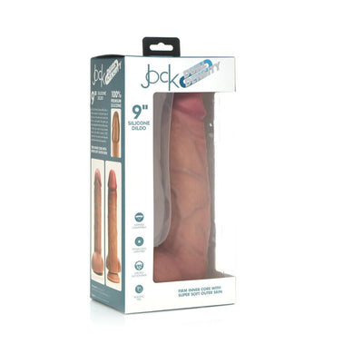 Jock Dual Density 9-inch silicone dildo with balls in light skin tone, shown in retail packaging with product details.