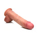 Light skin tone dual density silicone dildo with suction base and realistic detailing including veins and balls.
