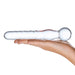 Clear glass dildo wand with spiral texture and rounded bulb end held in hand against white background.