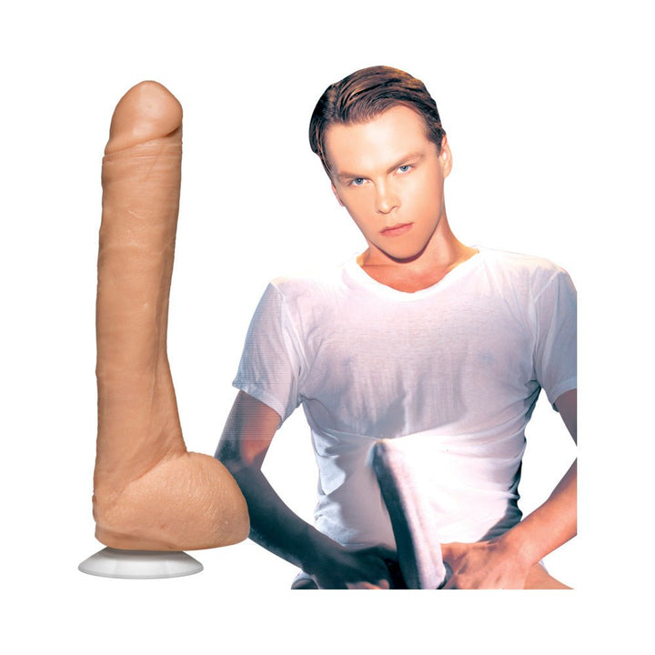 Beige realistic dildo with suction base displayed next to a man in a white t-shirt holding the product.